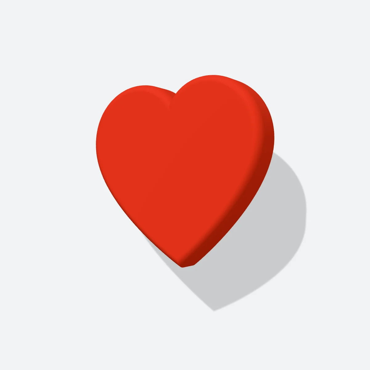 Un corazón rojo de material mate, el palo de Formación